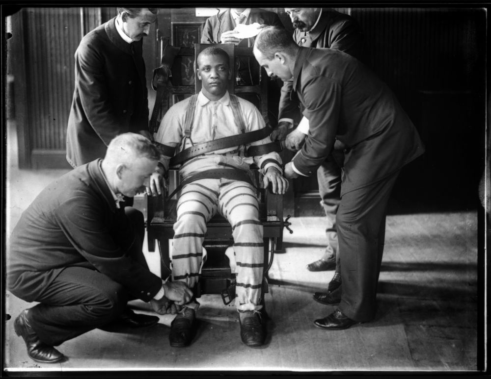IDENTIFIED: ‘An unidentified man is strapped into Sing Sing’s electric chair.’